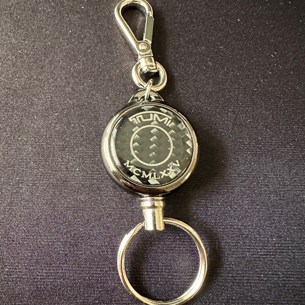 Tumi Black and Silver Retractable Key Holder